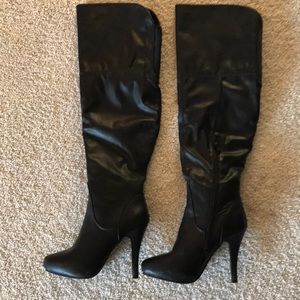 Over the knee black boots